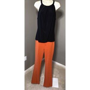 Zara Orange Pants 28x33 SZ M orange slacks front slit hem Flare cutouts